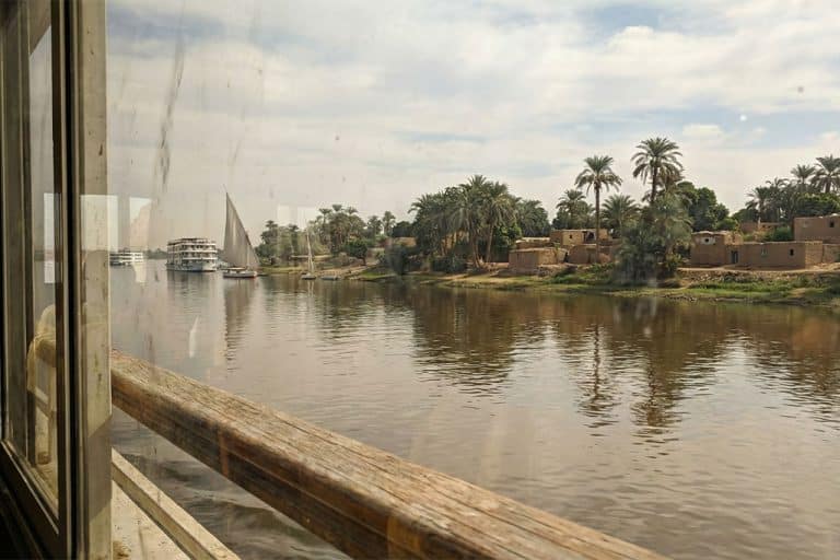 View of the Nile River from a cruise with lush scenery, nile cruise egypt, hurghada egypt snorkeling