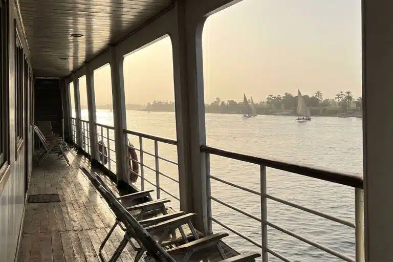 View from a Nile cruise showcasing the river and feluccas Egypt tour package, Giza Pyramids tour
