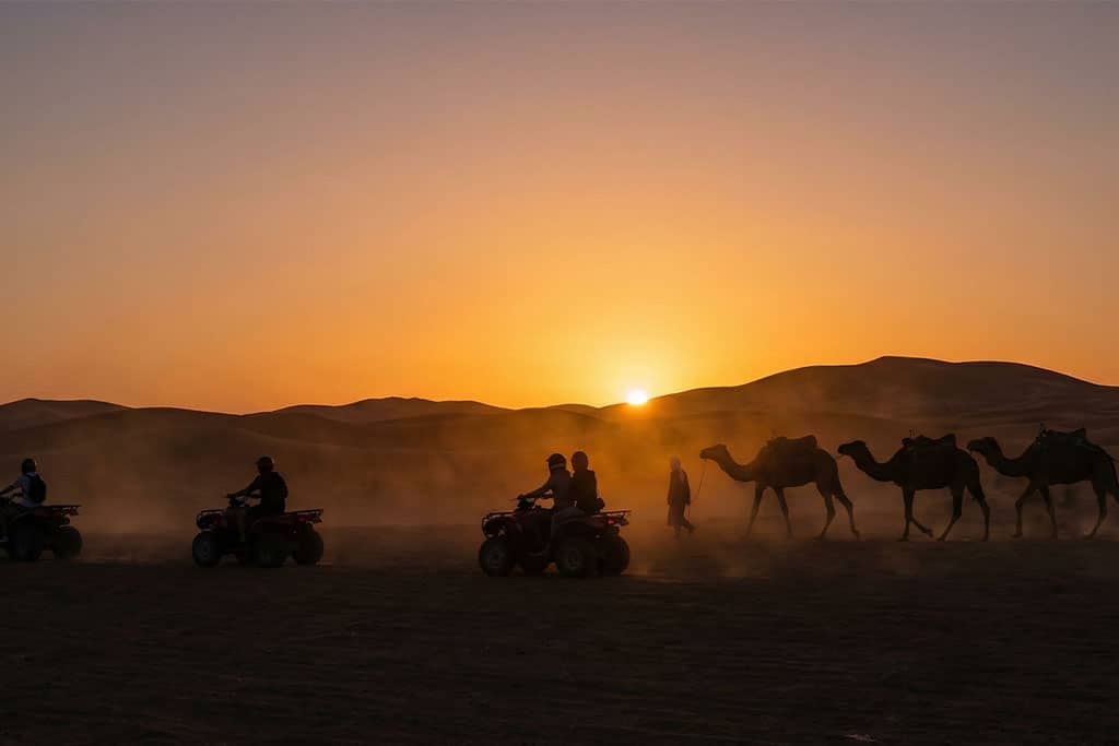 Sunset in the Hurghada desert with camels and ATVs hurghada desert safari, bedouin village hurghada