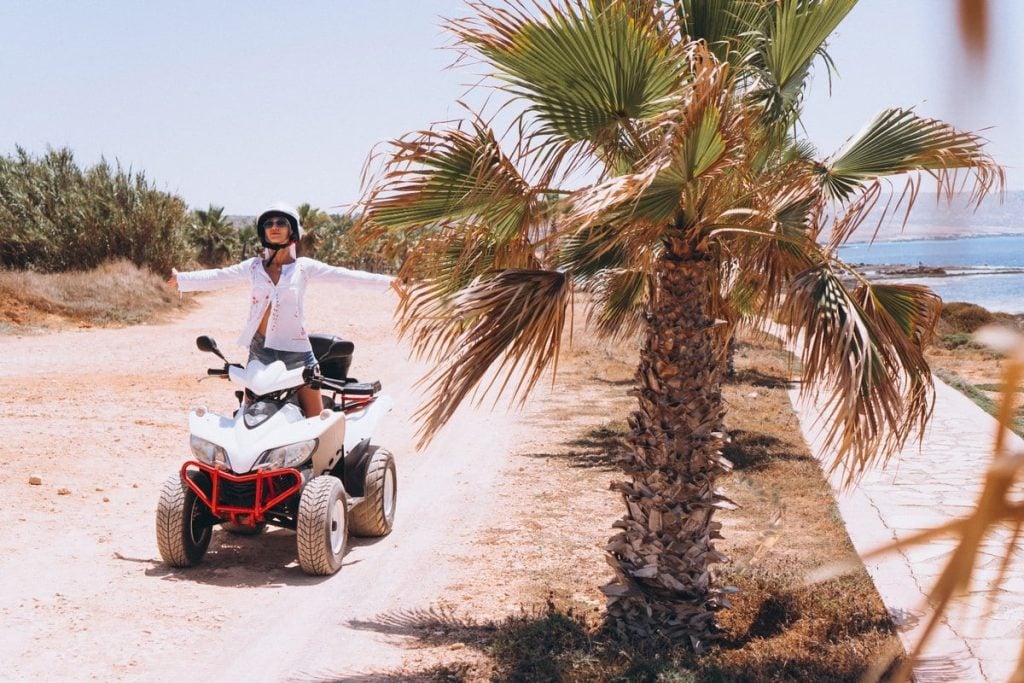 Woman enjoying quad biking hurghada desert safari, quad biking hurghada