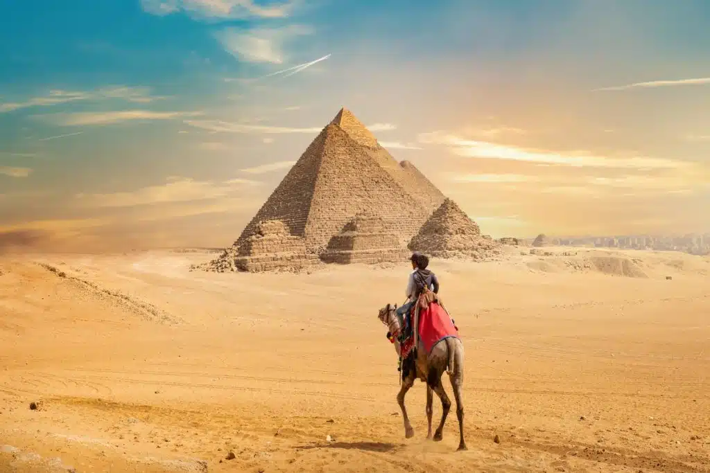 Camel ride near quad bike, great sphinx giza