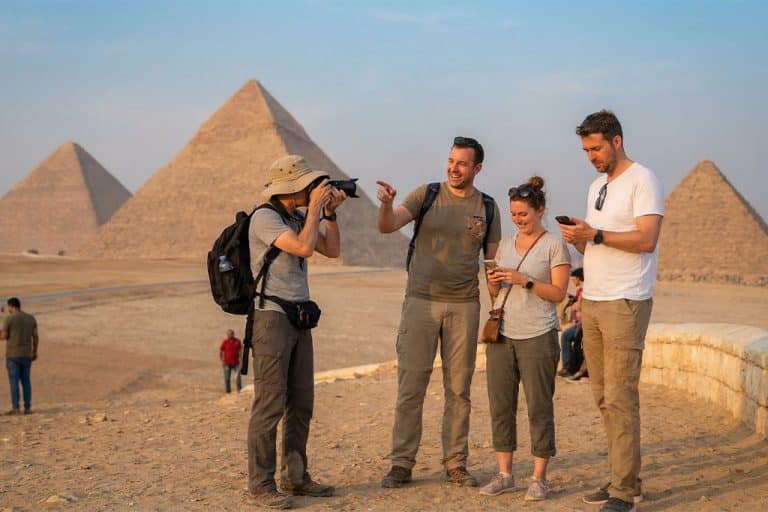 Group photo at the pyramids with pyramids photographer, private pyramids tour