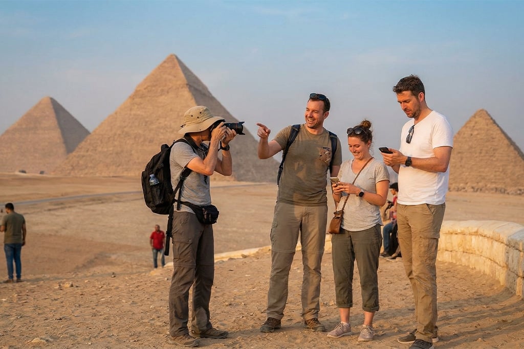 Group photo at the pyramids with pyramids photographer, private pyramids tour