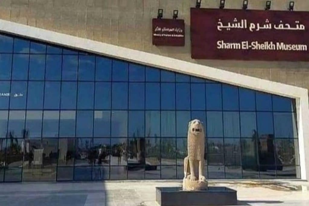 Sharm El-Sheikh Museum entrance featuring a lion statue and glass facade, the egypti the egyptian museum, the museum of cairo
