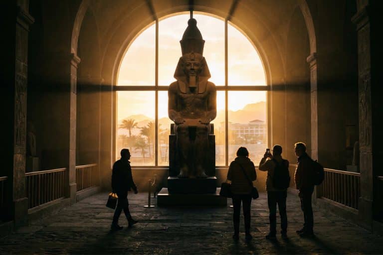 Visitors at admire a statue the egyptian museum, the museum of cairo