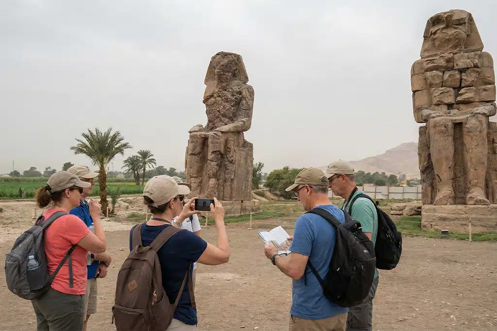 Visitors at the Colossi of Memnon during a trip to valley of the king trip to valley of the kings, valley of the kings inside