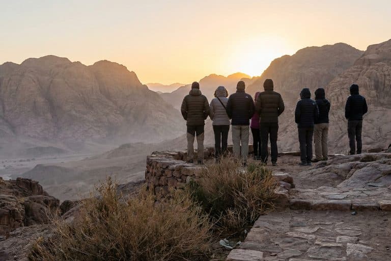 Group watching sunrise over mountains luxor tours, egypt luxor