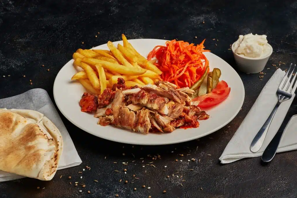 Delicious meal featuring grilled chicken and fries tour hurghada cairo, hurghada cairo tour
