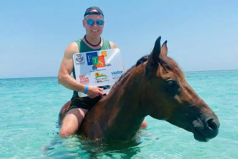 A rider enjoying in the Red Sea. horse riding tours