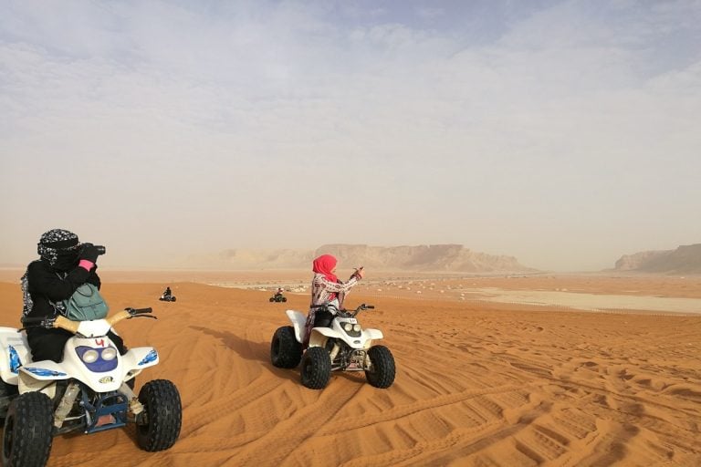 Riders enjoying a adventure in the desert quad biking, quad safari