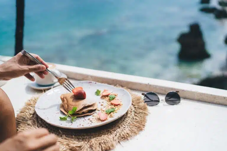 Breakfast pancakes with strawberries overlooking the sea el gouna day trip, el gouna holidays
