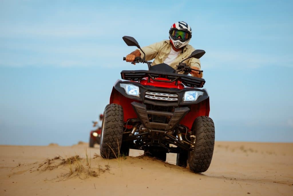 A rider enjoying hurghada quad biking, hurghada desert safari
