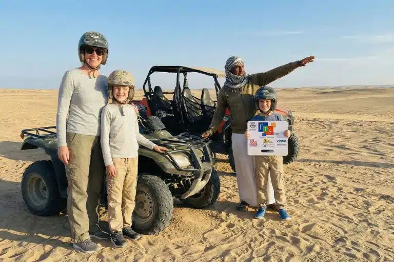 Family enjoying a adventure in the desert. quad buggy hurghada