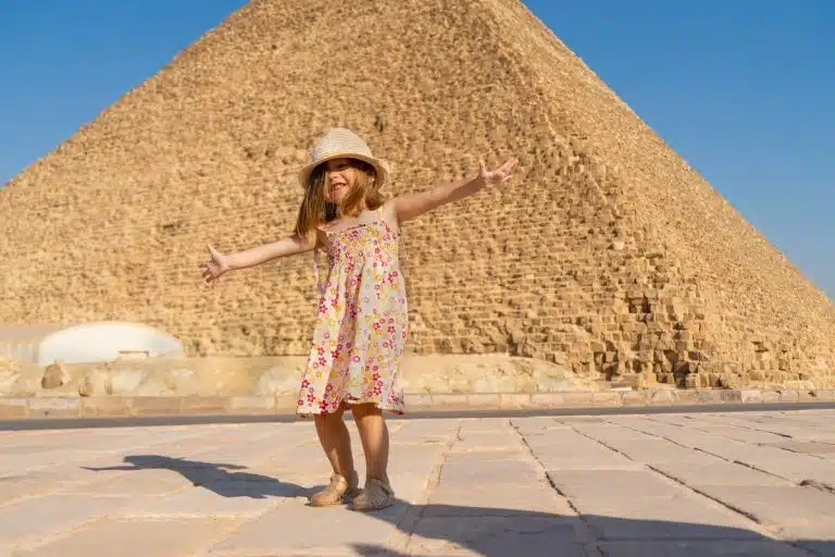 Child playing near the Pyramids during sharm el sheikh to cairo p sharm el sheikh to cairo plane, sharm el sheikh to pyramids