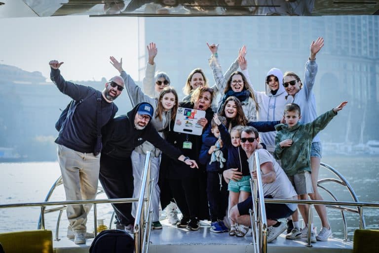 Group celebrating their sharm el sheikh to cairo flight