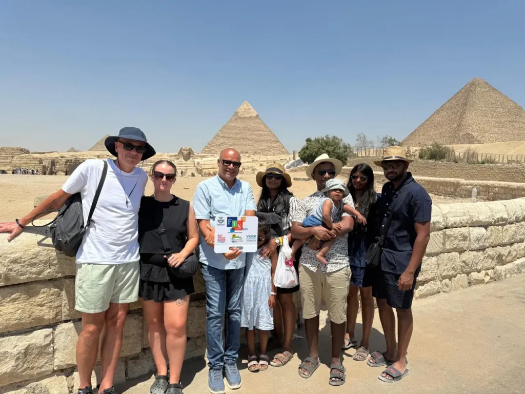 Group photo at the Pyramids of Giza christmas tour 2024, christmas tour bus