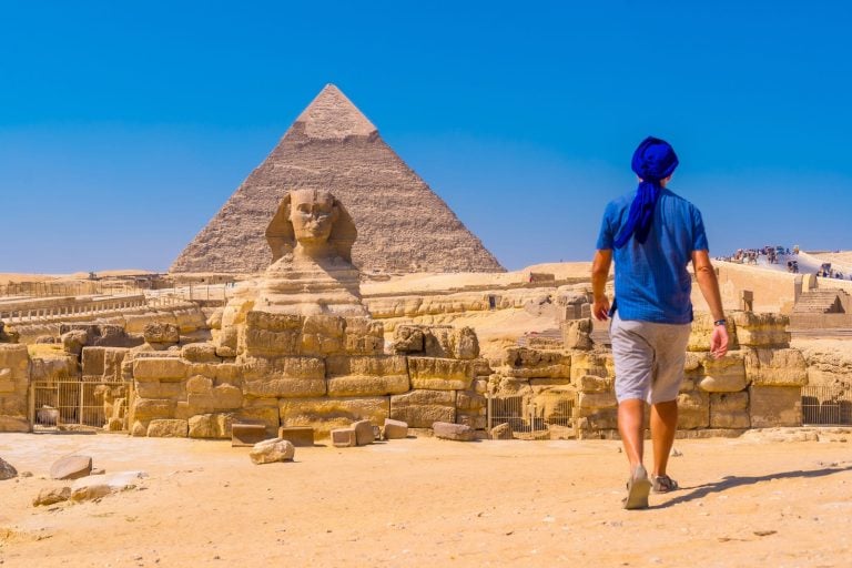 Traveler walking towards the Sphinx egypt family tours, luxor egypt tours