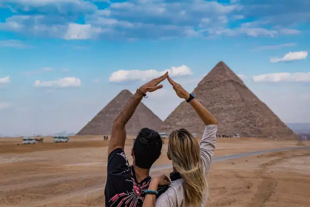 Couple admiring the Pyramids nile cruise egypt, nile river cruise from cairo