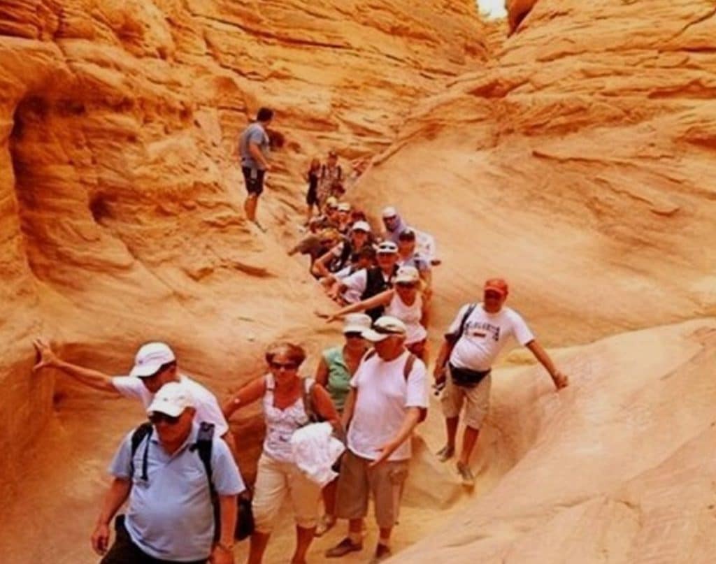Group of tourists exploring the in Dahab blue hole, blue lagoon